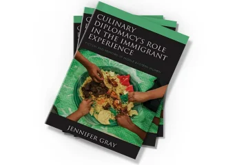 دانلود کتاب Culinary Diplomacy’s Role in the Immigrant